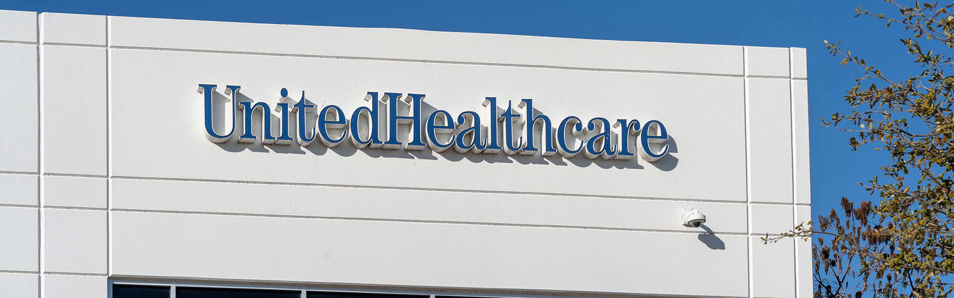 UnitedHealthcare sign on their office building in Irving, Texas / shutterstock.com