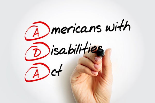 ADA Americans with Disabilities Act - civil rights law that prohibits discrimination based on disability, acronym text concept with marker / shutterstock.com